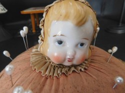 half doll pink baby face